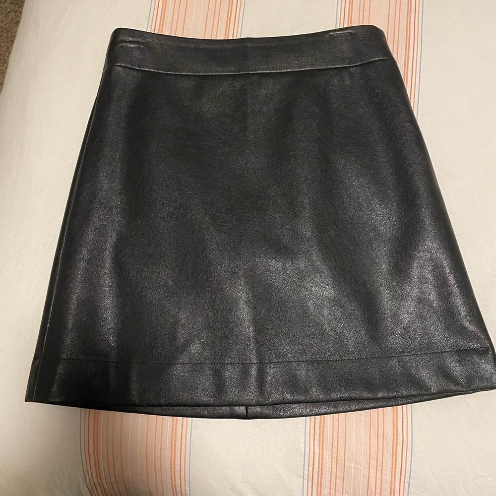 Black faux leather skirt.